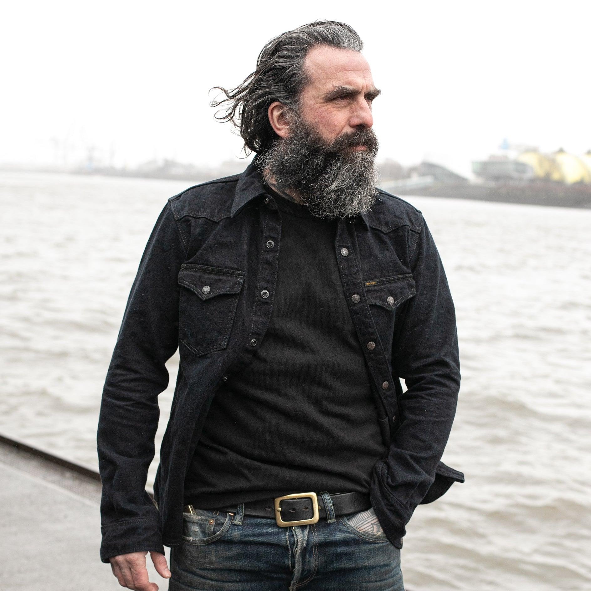 Image showing the IHSH-293-OD - 18oz Vintage Selvedge Denim CPO Shirt Indigo Overdyed Black which is a Shirts described by the following info Back In, Denim Jackets, Iron Heart, Released, Shirts, Tops and sold on the IRON HEART GERMANY online store