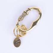 Image showing the Peanuts & Co PEANUTS CARABINER- Brass which is a Others described by the following info Accessories, Others, Peanuts & Co, Released and sold on the IRON HEART GERMANY online store